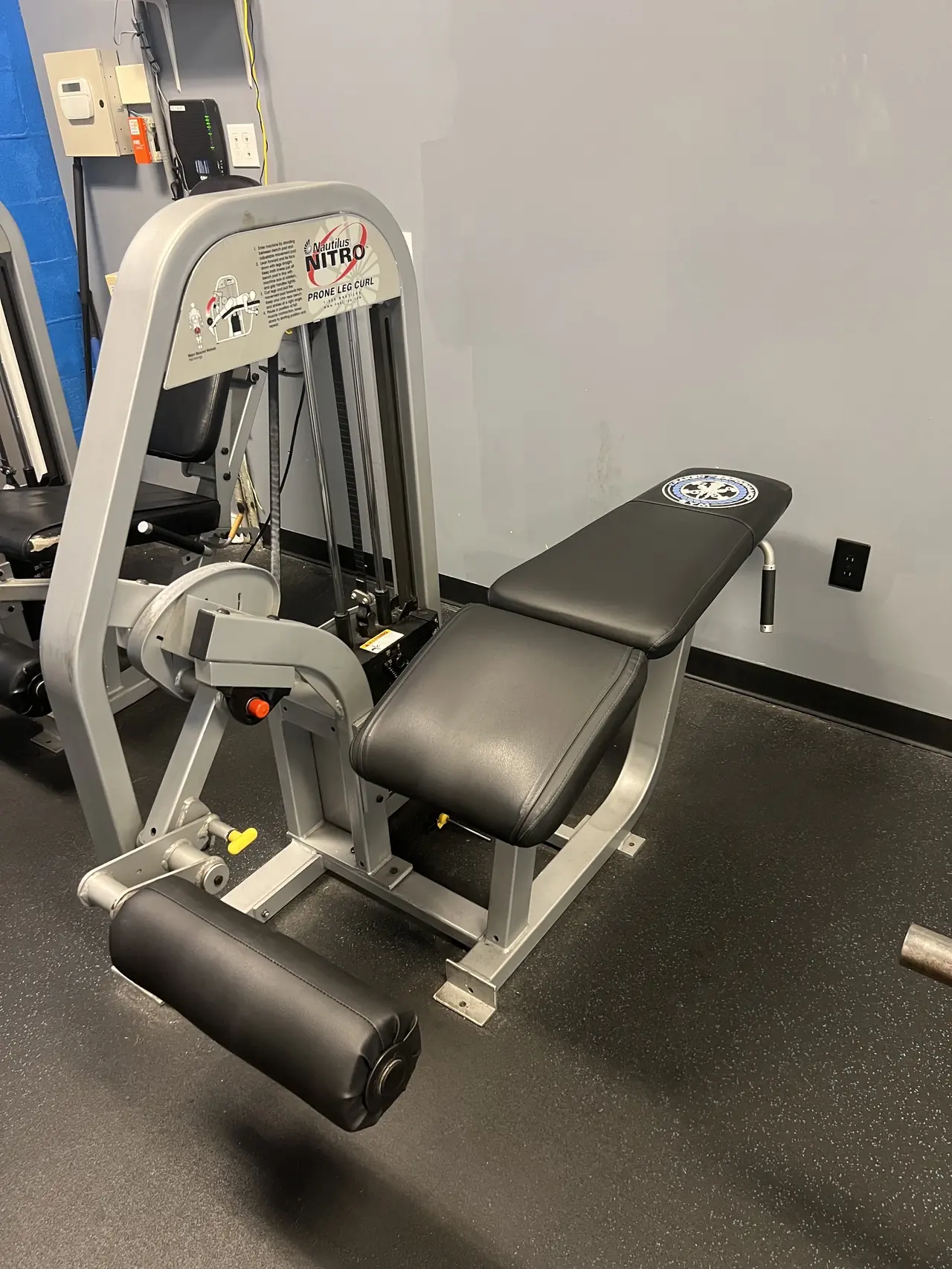 Nautilus Nitro prone leg curl with a Kraken Performance Gym pad.
